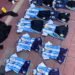 Demoraron a una mujer y pusieron al resguardo a dos adolescentes que sustrajeron indumentaria deportiva de un local comercial